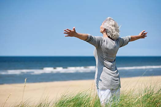 healthy older woman at the beach